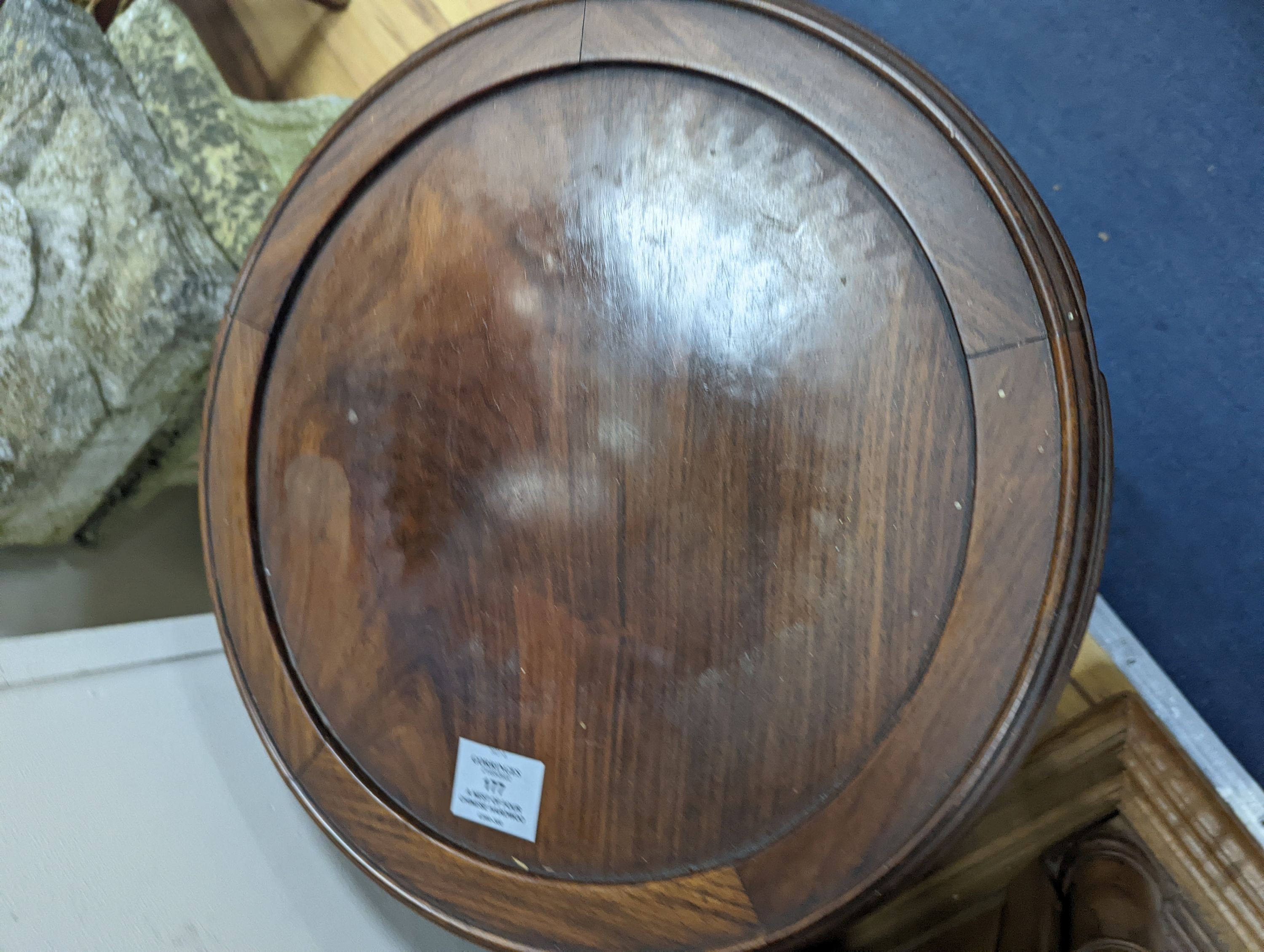 A nest of four Chinese hardwood circular tables, largest diameter 40cm, height 67cm